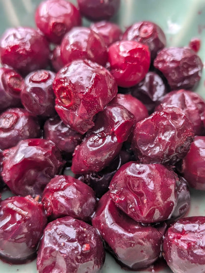 Close-up of red chuckleberries after carbonic maceration